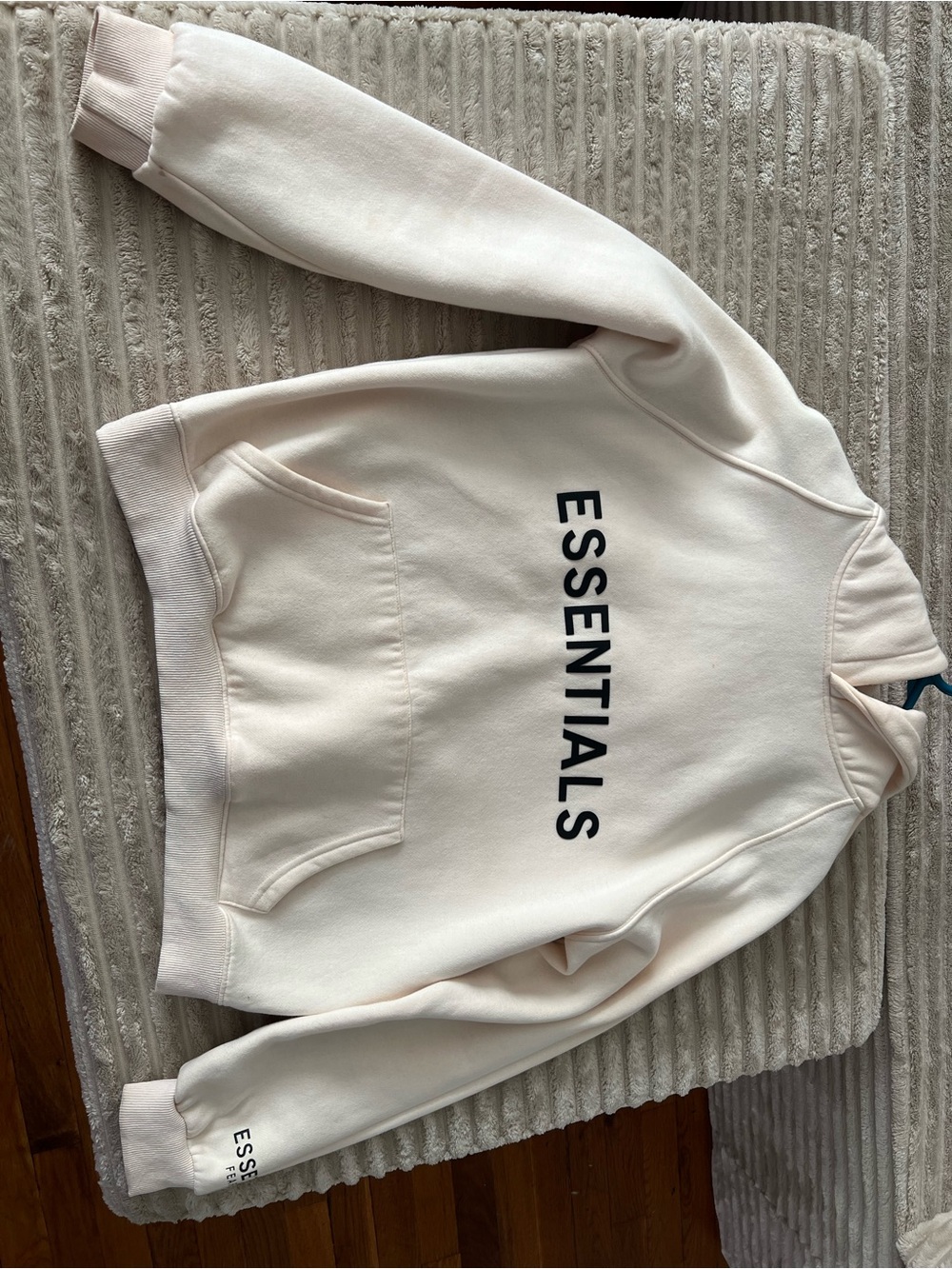 Essentials Cream Pullover Hoodie with Black Logo